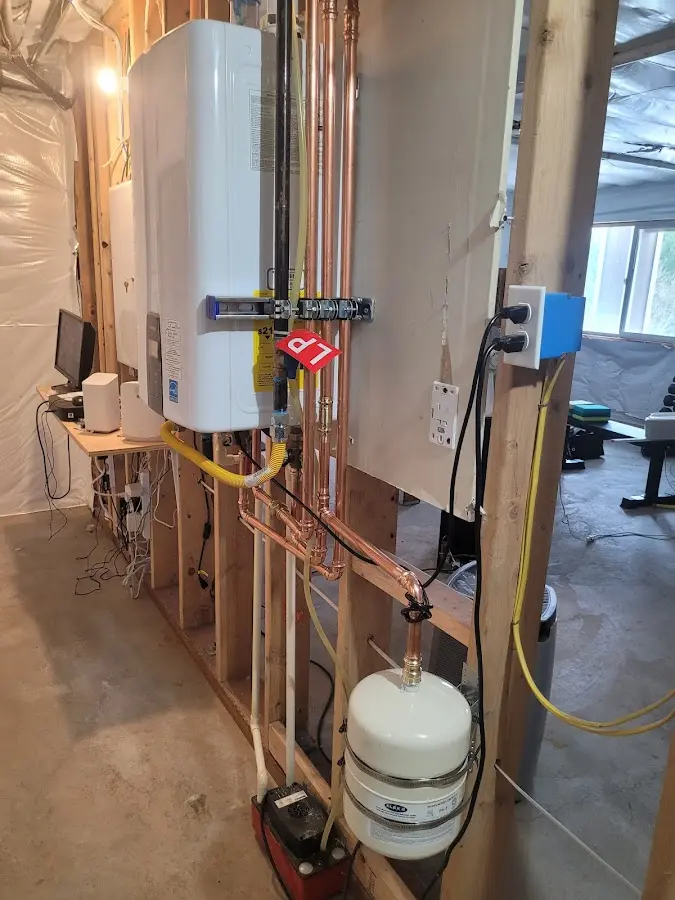 Licensed plumber repairing a kitchen sink in Groveport